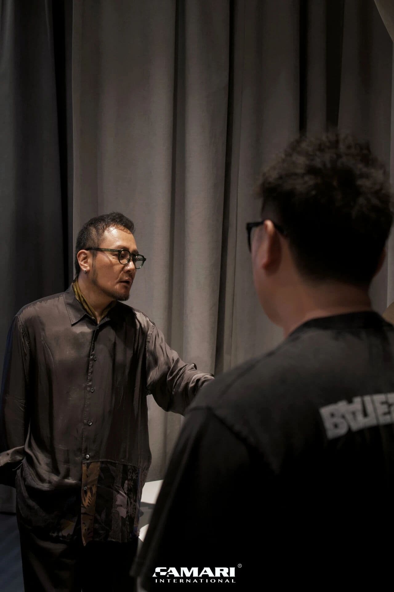 Designer Wu Bin discussing the WEIMO furniture installation
